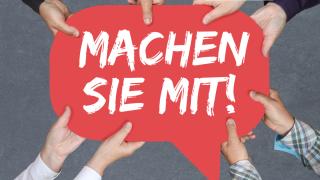 Mehrere Hände halten gemeinsam ein Schild, auf dem steht: Machen Sie mit!
